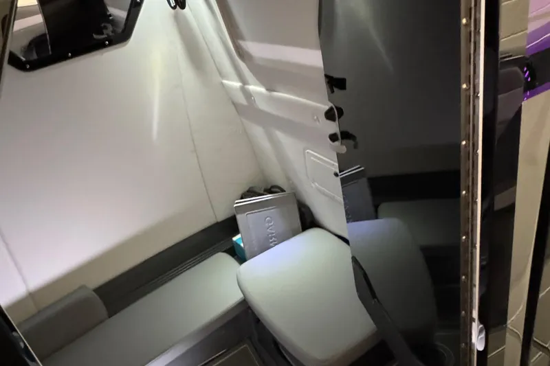 Slide: The Image of Interior cabin of 2026 Sunsation 32 CCX boat, featuring seating and modern design. - 13