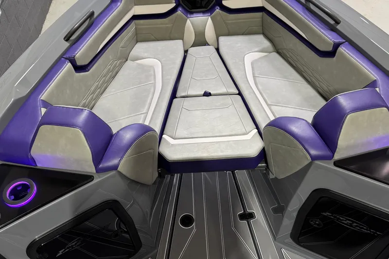 Slide: The Image of Luxurious interior of 2026 Sunsation 32 CCX boat with purple and gray seating. - 18