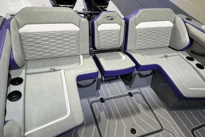 Slide: The Image of Luxurious seating in 2026 Sunsation 32 CCX boat with gray and purple upholstery. - 8
