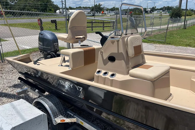 Slide: The Image of 2025 G3 Bay 17 boat with Yamaha motor, parked on a trailer. - 3