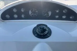 Slide: The Image of Dashboard of 2001 Bayliner 3988 Motoryacht with compass and gauges. - 42