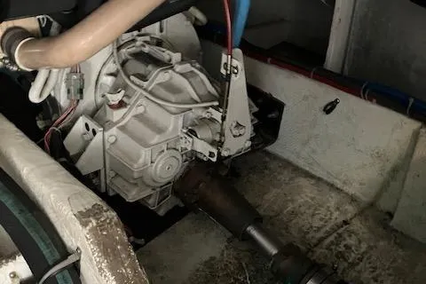 Slide: The Image of Engine compartment of a 2001 Bayliner 3988 Motoryacht, showcasing mechanical components. - 60