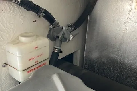 Slide: The Image of Engine compartment of 2001 Bayliner 3988 Motoryacht with Westerbeke coolant tank. - 64