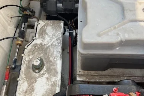 Slide: The Image of Engine compartment of a 2001 Bayliner 3988 Motoryacht, showcasing mechanical components and wiring. - 68