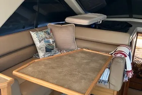 Slide: The Image of Interior of 2001 Bayliner 3988 Motoryacht with cozy seating and table. - 9