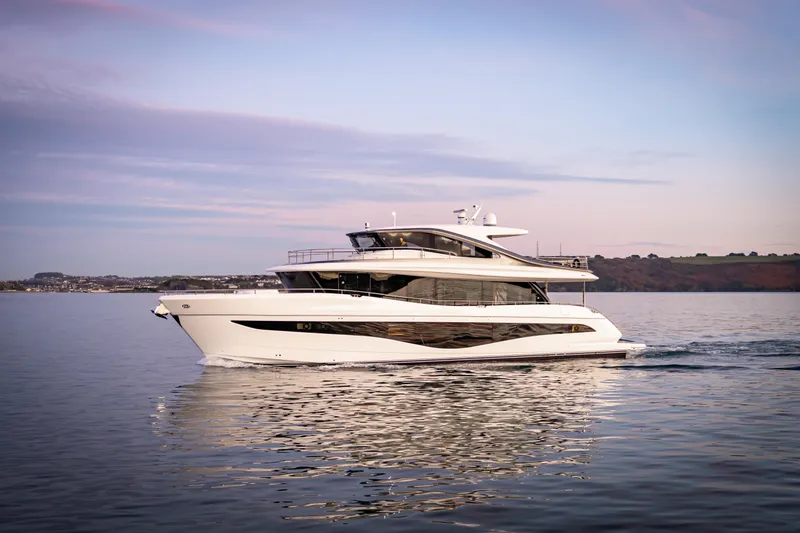 The Image of Luxurious 2025 Princess X80 yacht cruising on calm waters at sunset. - 0