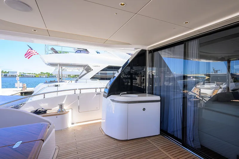 Slide: The Image of Luxury yacht Princess X80, 2026 model, featuring elegant deck and sea view. - 39