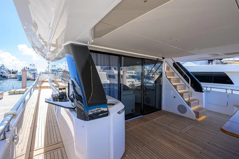 Slide: The Image of Luxurious Princess X80 yacht deck with modern amenities, year 2026. - 42