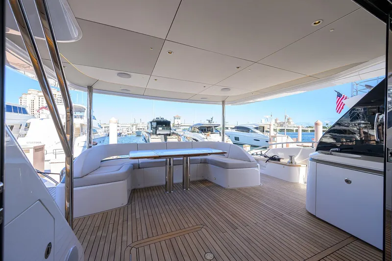 Slide: The Image of Luxurious deck of Princess X80 yacht in harbor, year 2026. - 47