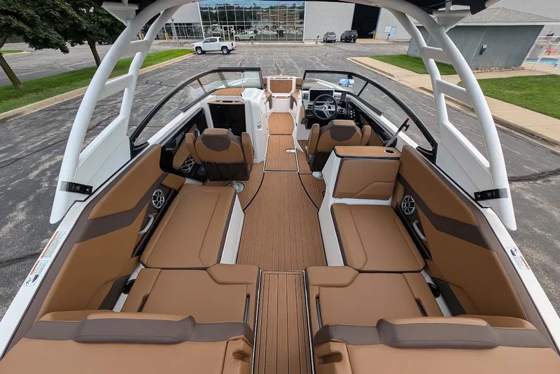 Slide: The Image of 2024 Yamaha Boats 252SE interior with spacious seating and modern design. - 18