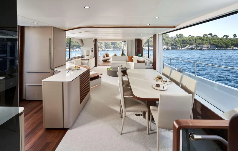 Slide: The Image of Luxurious interior of 2026 Princess Y80 yacht with elegant dining area and scenic ocean view. - 13