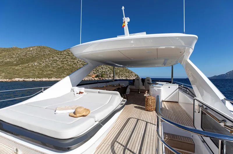 Slide: The Image of Luxurious 2026 Princess Y80 yacht deck with sunbed, scenic ocean view. - 3