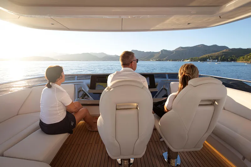 Slide: The Image of People enjoying a scenic view on a 2026 Princess Y80 yacht. - 4