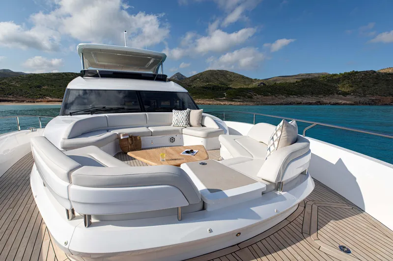 Slide: The Image of Luxurious 2026 Princess Y80 yacht with elegant deck seating and scenic ocean view. - 6