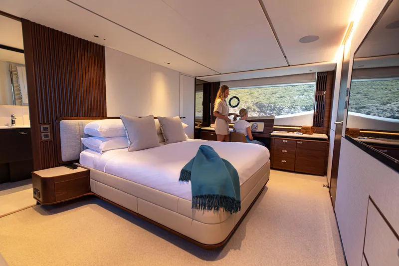 Slide: The Image of Luxurious bedroom interior on 2026 Princess Y80 yacht with scenic window view. - 7