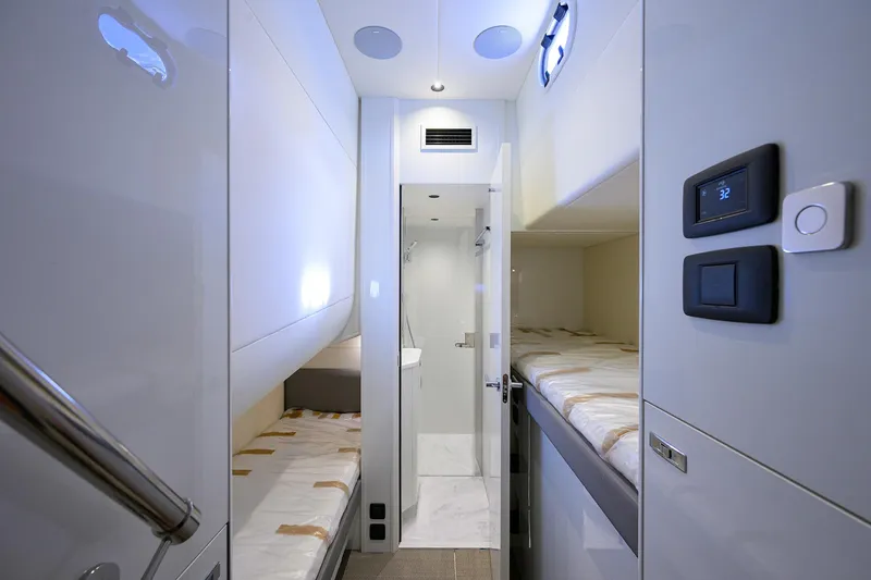 Slide: The Image of Interior of 2026 Princess S72 yacht with modern bunk beds and sleek design. - 15