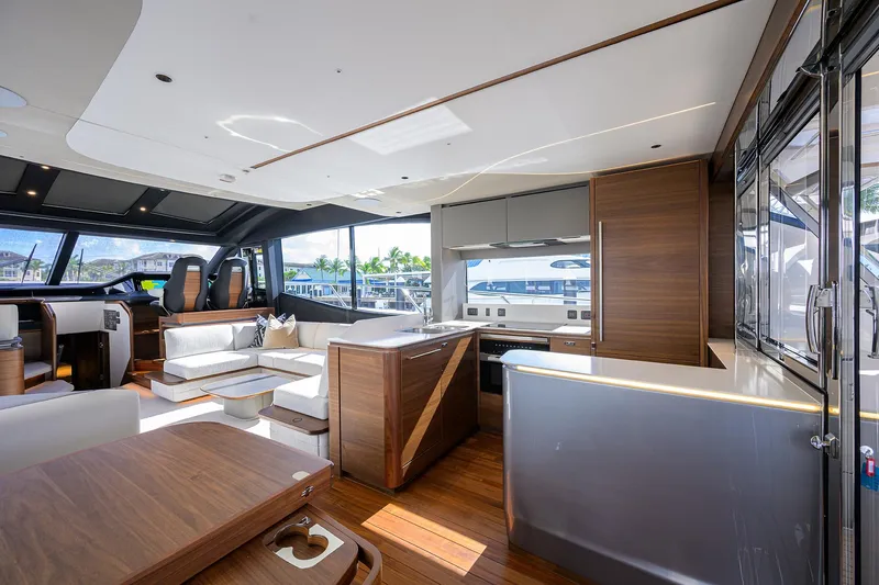 Slide: The Image of Luxurious interior of 2026 Princess S72 yacht with modern kitchen and seating area. - 18
