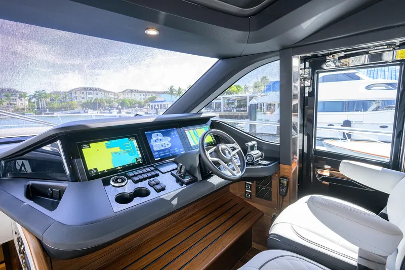 Slide: The Image of Luxurious 2026 Princess S72 yacht cockpit with advanced navigation displays and plush seating. - 20