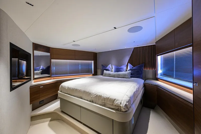 Slide: The Image of Luxurious bedroom interior of 2026 Princess S72 yacht with modern design and ambient lighting. - 21