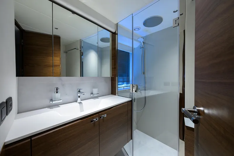 Slide: The Image of Luxurious bathroom in 2026 Princess S72 yacht with modern fixtures and glass shower. - 22