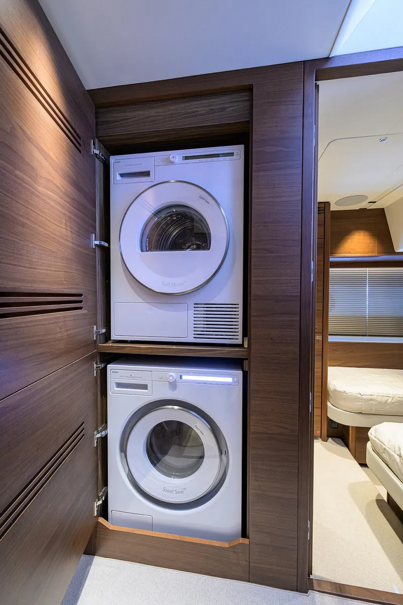 Slide: The Image of Stacked washer and dryer in 2026 Princess S72 yacht interior. - 26
