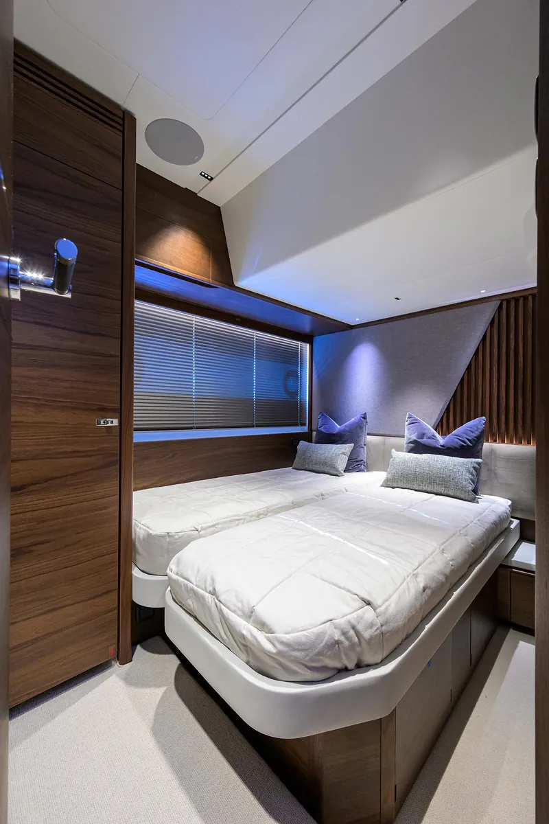Slide: The Image of Luxurious cabin interior of 2026 Princess S72 yacht with twin beds and modern decor. - 28