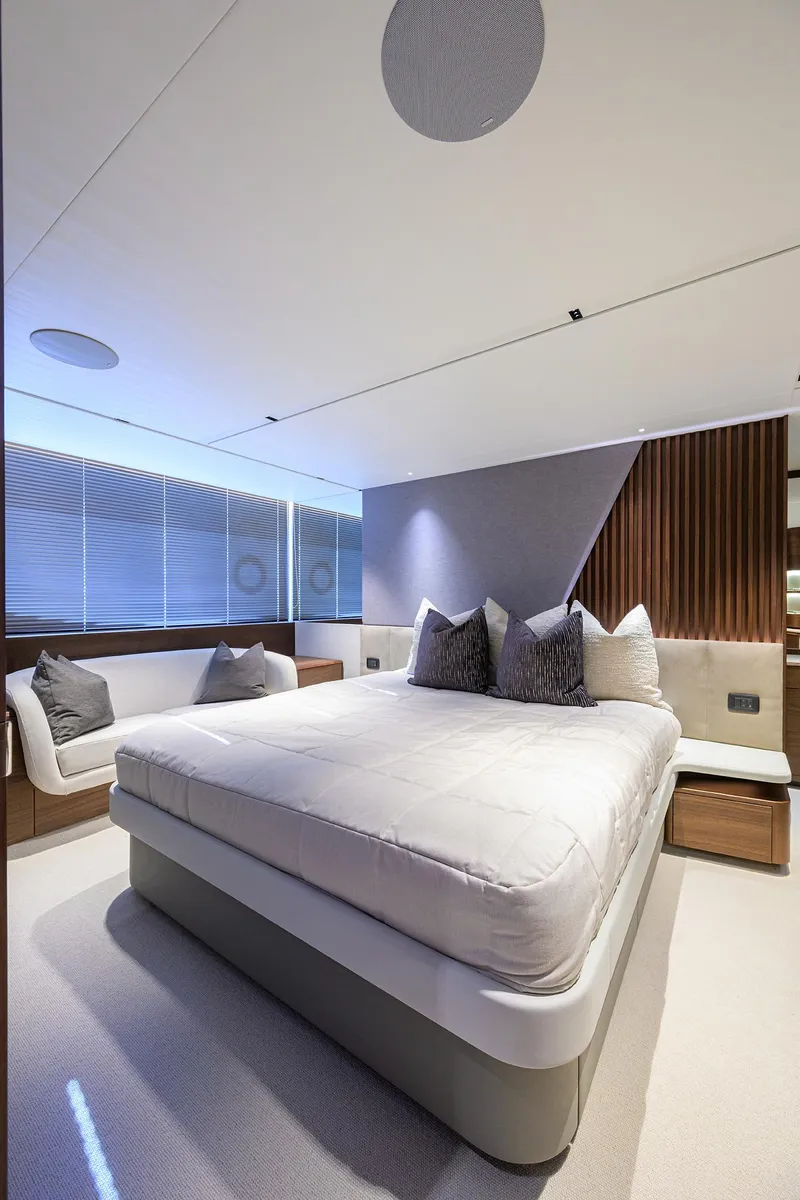 Slide: The Image of Luxurious bedroom interior on 2026 Princess S72 yacht, featuring modern design and elegant furnishings. - 29