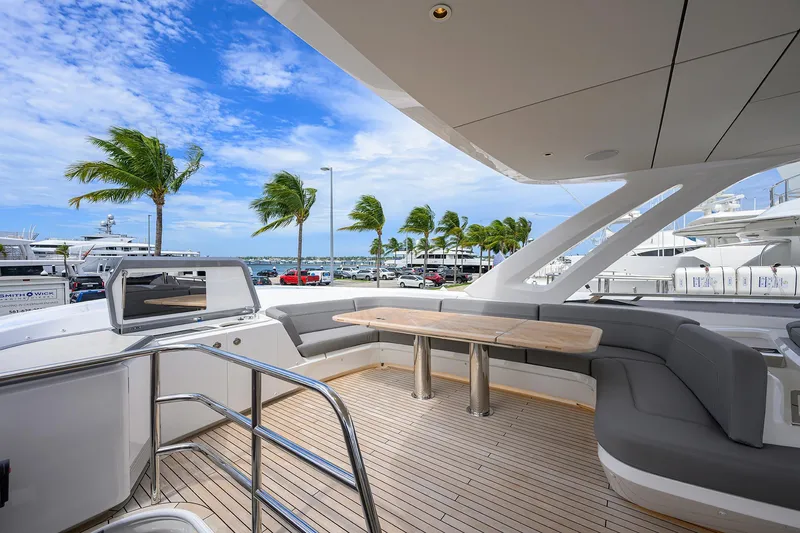 Slide: The Image of Luxurious 2026 Princess S72 yacht deck with elegant seating and ocean view. - 6
