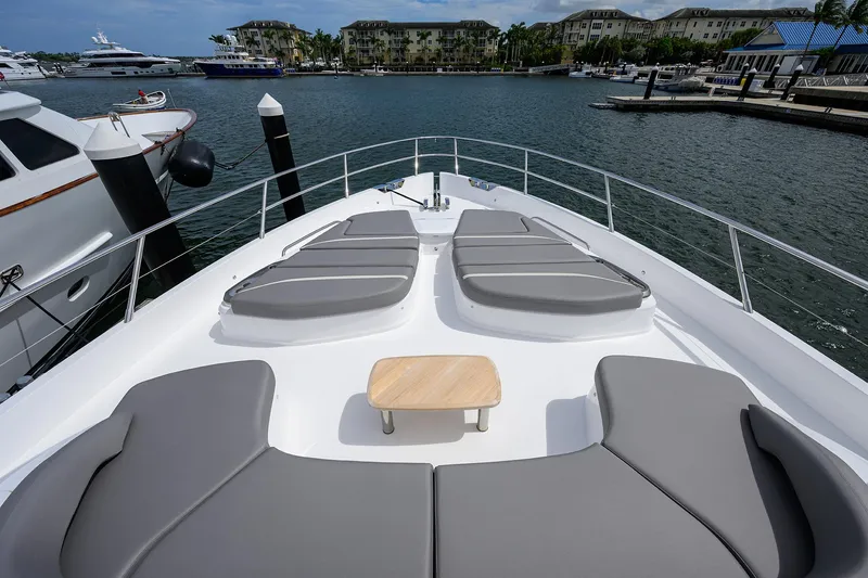 Slide: The Image of Luxury 2026 Princess S72 yacht deck with sun loungers in marina setting. - 8