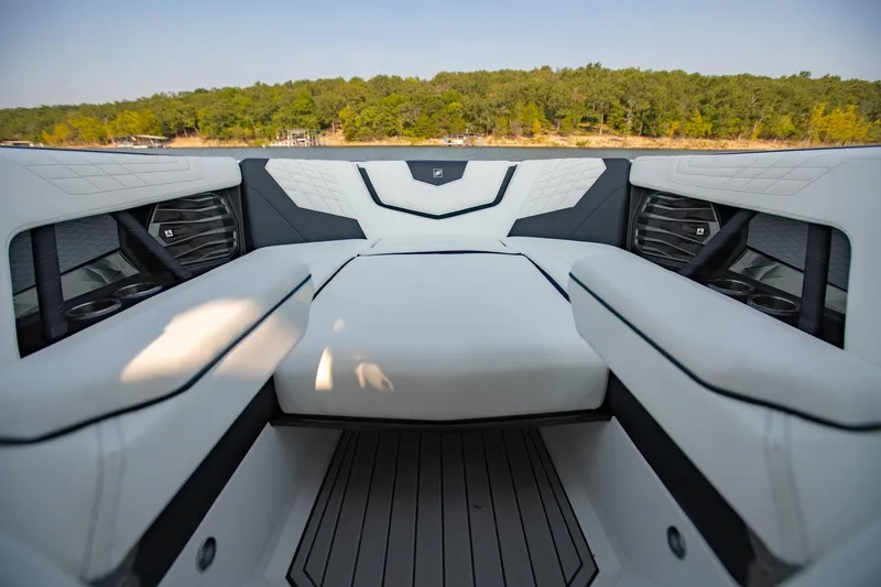 Slide: The Image of 2022 Nautique Super Air Nautique G25 interior with luxurious seating and modern design. - 20
