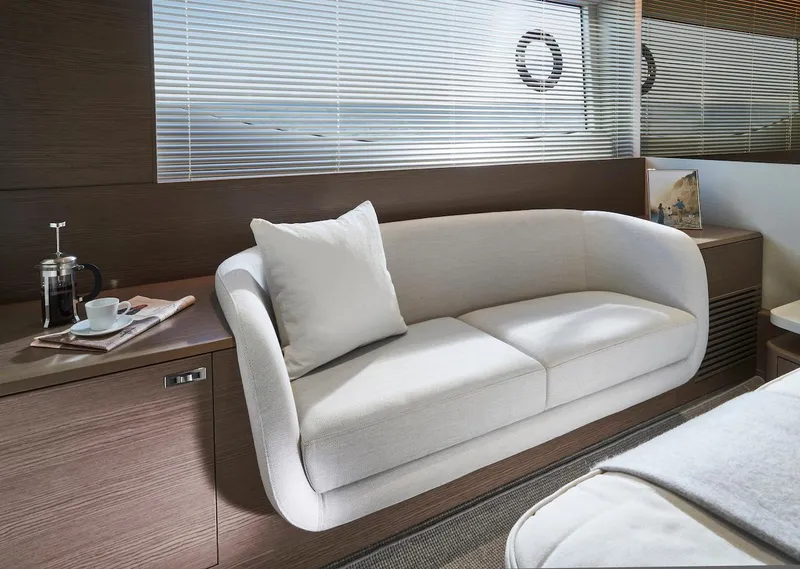 Slide: The Image of Luxurious interior of 2025 Princess Y72 Motor Yacht with elegant white sofa. - 37