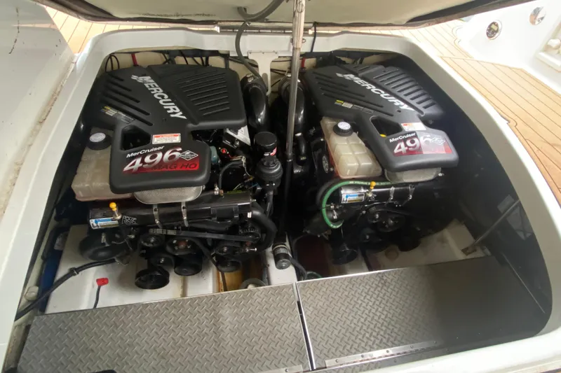 Slide: The Image of Twin MerCruiser 496 MAG HO engines in a 2004 Formula 370ss boat engine compartment. - 31