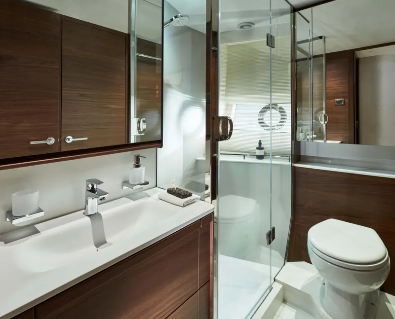 Slide: The Image of Luxurious bathroom in 2025 Princess F65 yacht with modern fixtures and glass shower. - 4