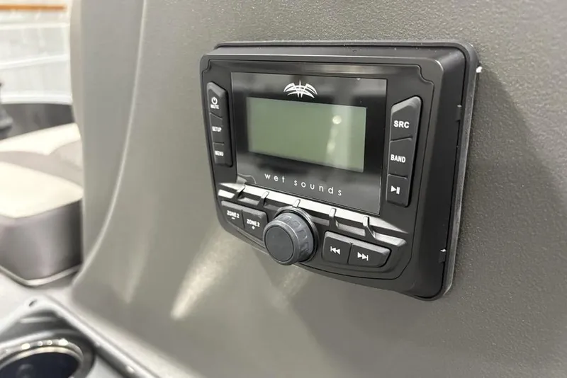 Slide: The Image of 2026 Sun Tracker Bass Buggy 16 XL Select audio system with control panel. - 13