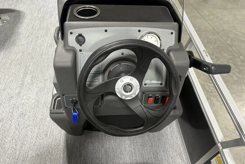Slide: The Image of Steering console of 2026 Sun Tracker Bass Buggy 16 XL Select pontoon boat. - 14