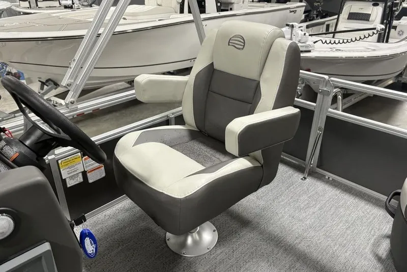 Slide: The Image of 2026 Sun Tracker Bass Buggy 16 XL Select captain's chair, gray and white upholstery. - 17