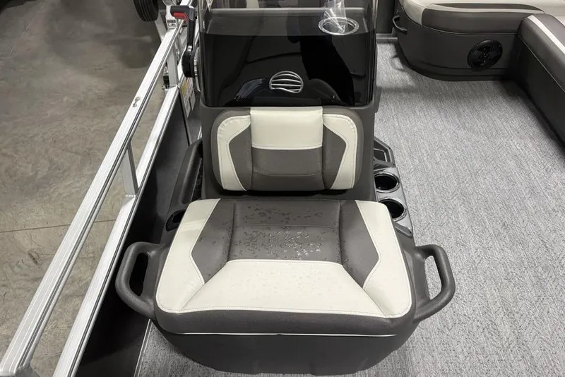 Slide: The Image of 2026 Sun Tracker Bass Buggy 16 XL Select boat seat with cup holders and modern design. - 4