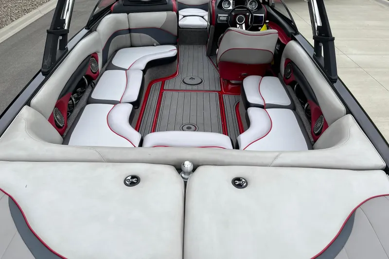Slide: The Image of 2013 Malibu Wakesetter 23 LSV interior with stylish seating and modern dashboard design. - 5