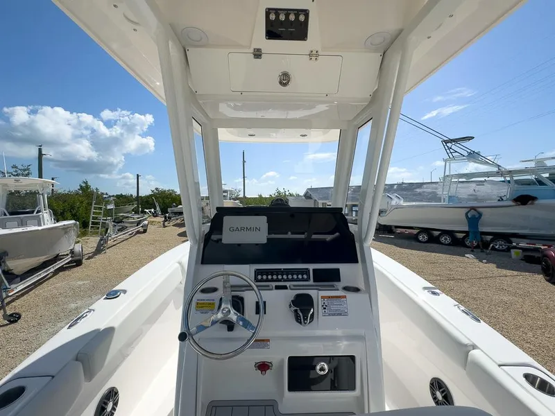 Slide: The Image of 2025 Sea Fox 228 Commander boat cockpit with Garmin navigation system. - 14