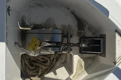 Slide: The Image of Anchor compartment of 2011 Everglades 320 EX with Tower, featuring rope and chain. - 12