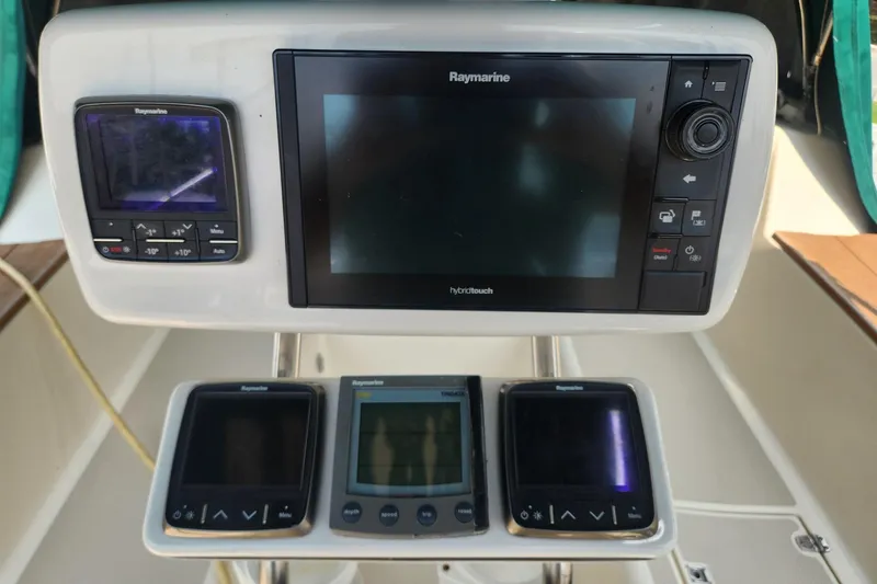 Slide: The Image of Raymarine navigation system on 2000 Island Packet 380 sailboat cockpit. - 13