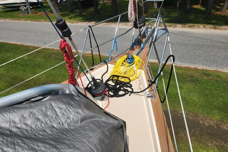 Slide: The Image of Deck of 2000 Island Packet 380 sailboat with ropes and equipment. - 17