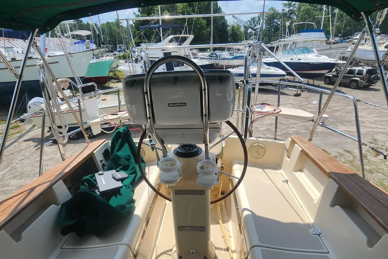 Slide: The Image of Cockpit view of 2000 Island Packet 380 sailboat with steering wheel and NavPod system. - 9