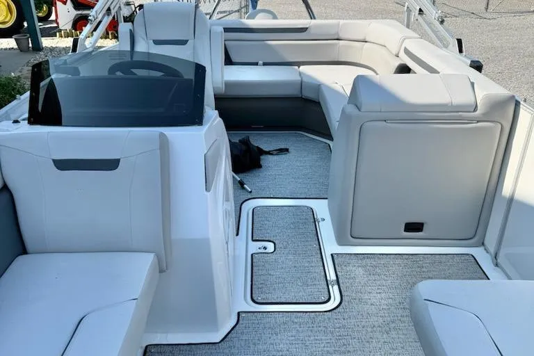 Slide: The Image of 2026 Hurricane FD1960RE3-OB boat interior with spacious seating and modern design. - 5