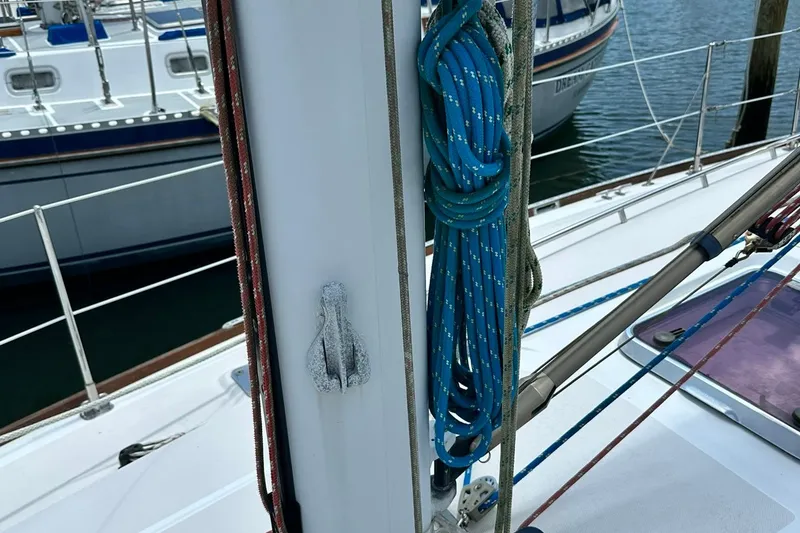 Slide: The Image of Sailboat deck with ropes and rigging, Sabre 386, 2007 model, docked at marina. - 24