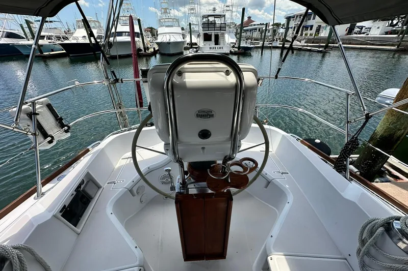 Slide: The Image of Cockpit view of 2007 Sabre 386 sailboat docked in a marina. - 33