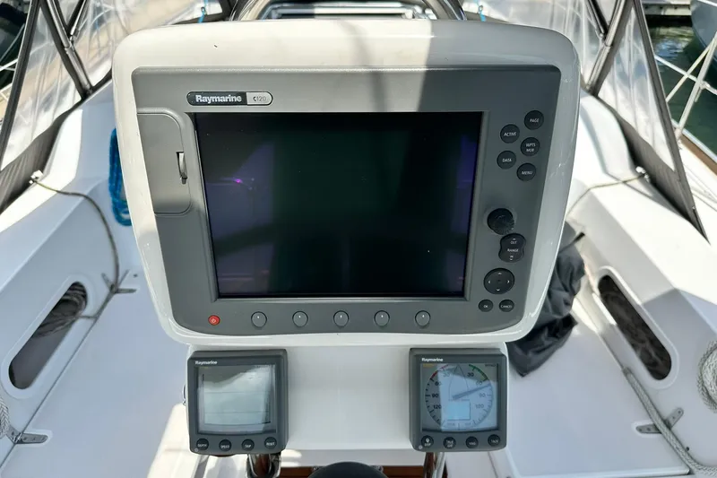 Slide: The Image of Cockpit of 2007 Sabre 386 sailboat with Raymarine navigation equipment. - 34