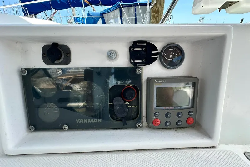 Slide: The Image of Control panel of a 2007 Sabre 386 sailboat with Yanmar and Raymarine instruments. - 36