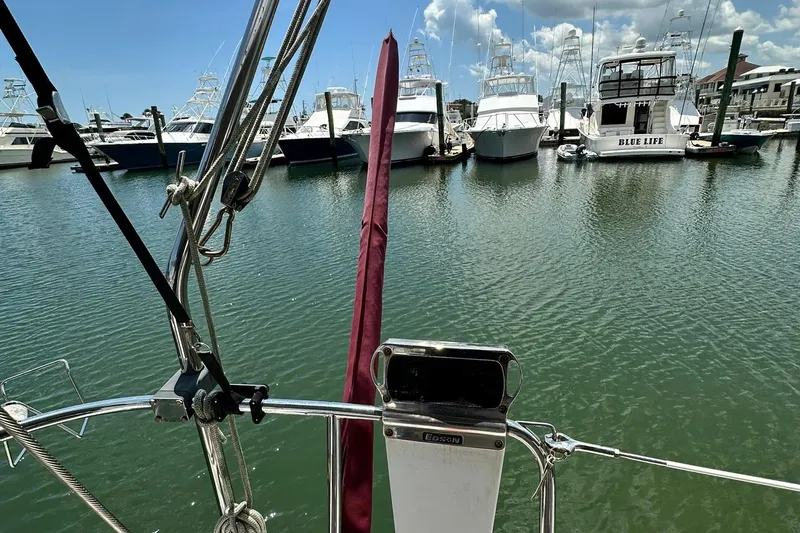 Slide: The Image of View from Sabre 386 sailboat, 2007 model, overlooking marina with docked yachts. - 39