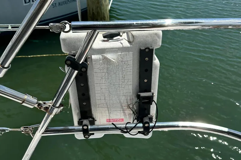 Slide: The Image of Sailing equipment mounted on a Sabre 386 yacht, 2007 model, with water in the background. - 40